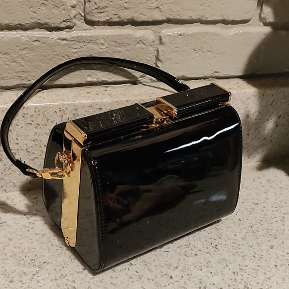 Source Unknown Handbags - Source Unknown Black and Gold Clutch